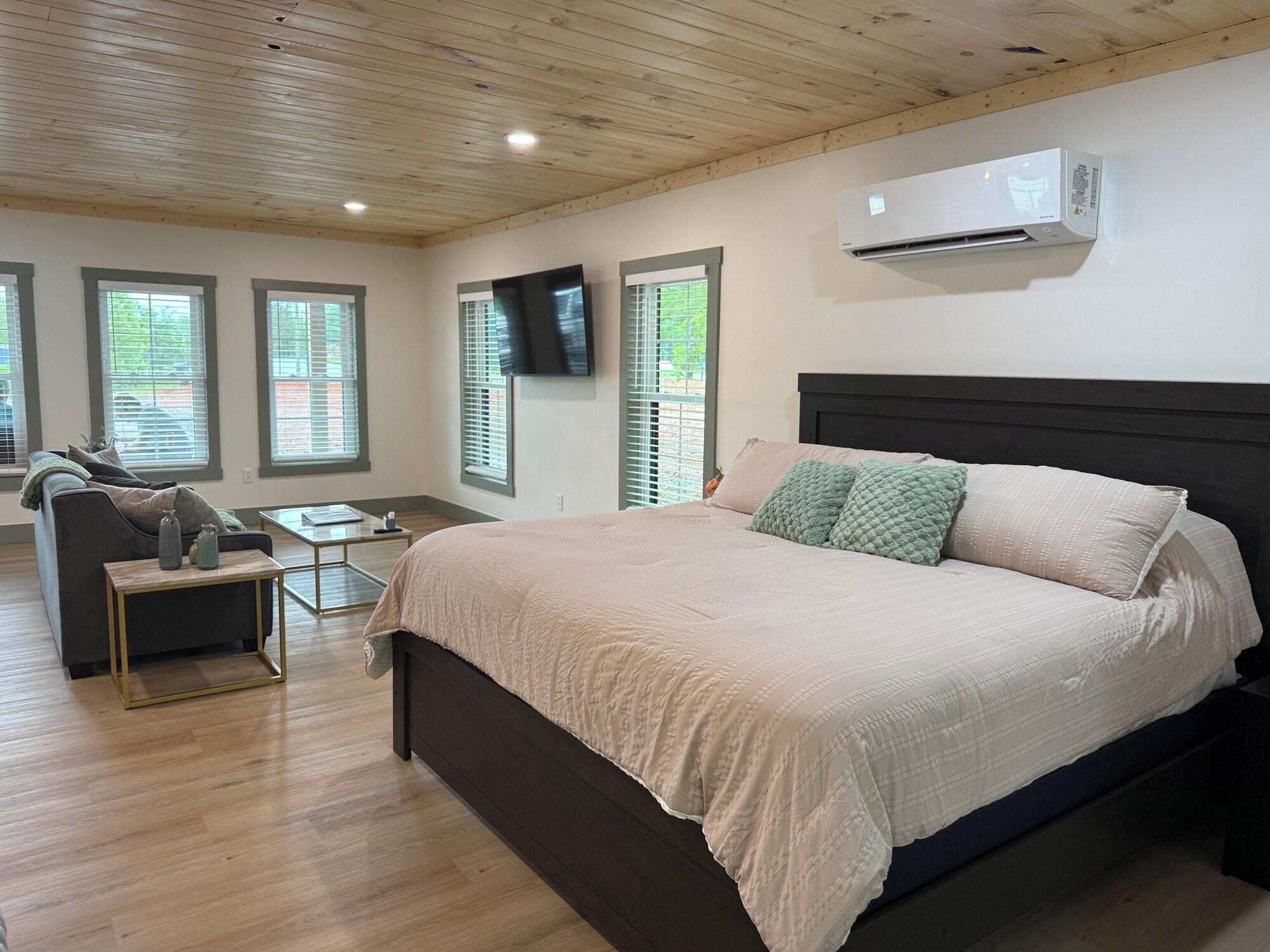 Bed, sitting area and smart TV in the studio at Hideaway at Wolf Creek